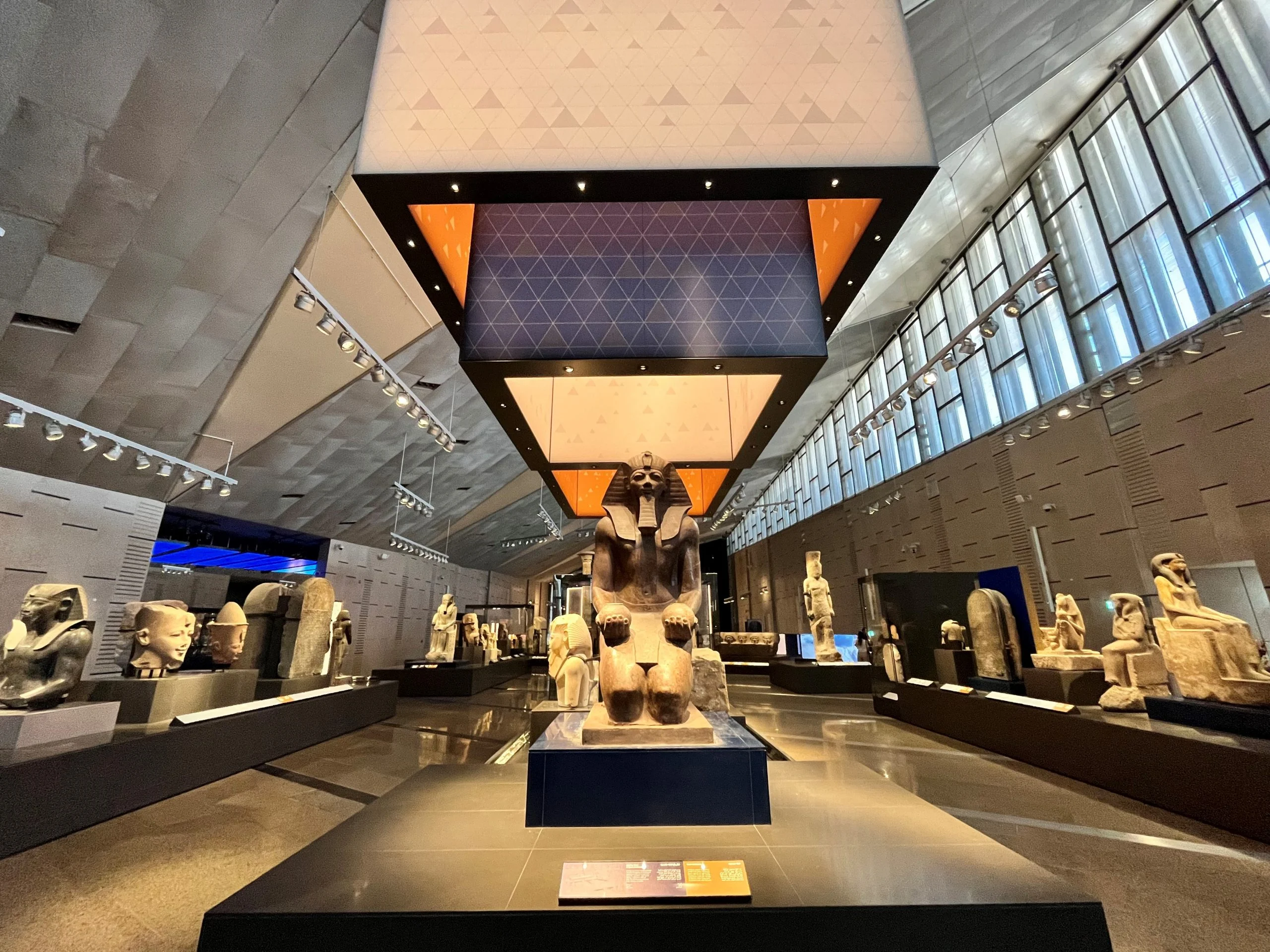 Ancient Egyptian statues displayed inside Grand Museum