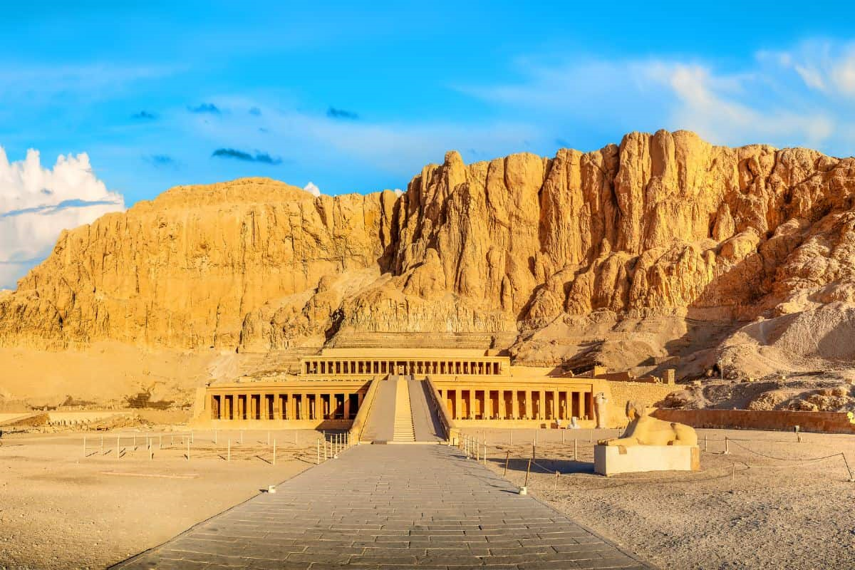 Hatshepsut Temple beneath limestone cliffs Luxor