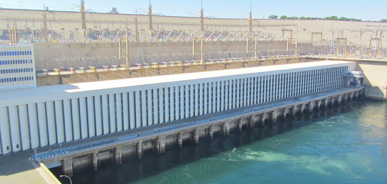 side view of the Aswan High Dam showing it's concrete structure and flowing water in Aswan,Egypt