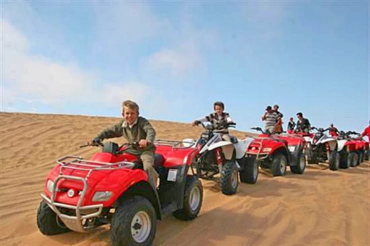Tourist enjoying a quad biking experience in Egypt