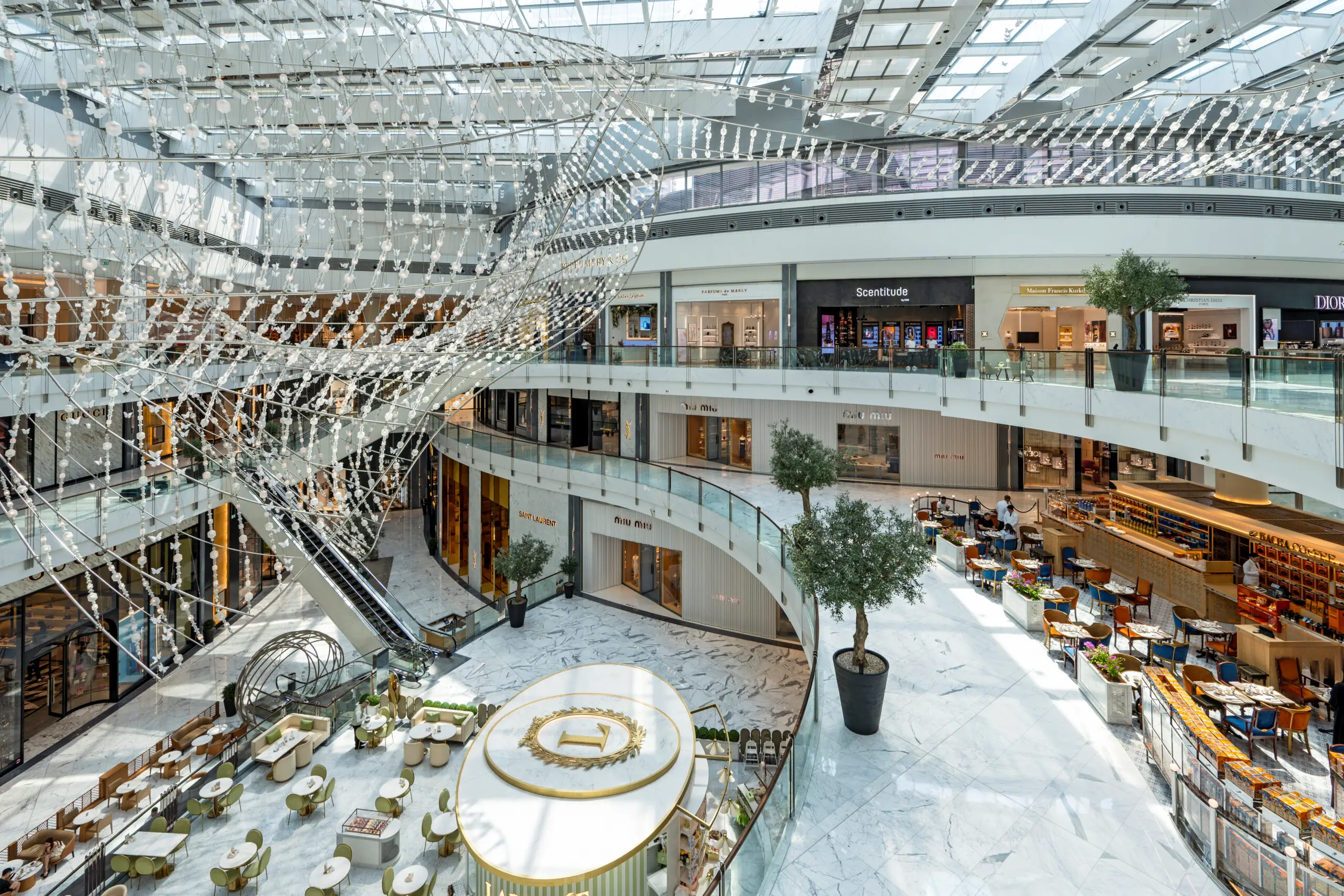 Interior view of Dubai Mall with luxury shops and visitors