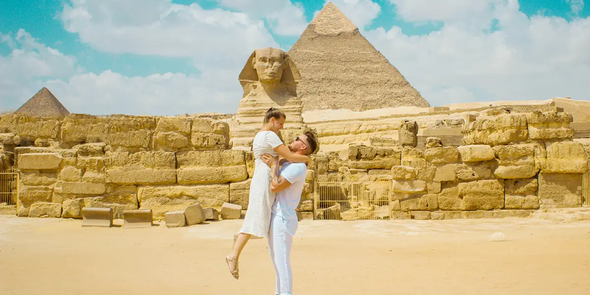 the Great Sphinx of Giza with the Great Pyramid of Giza