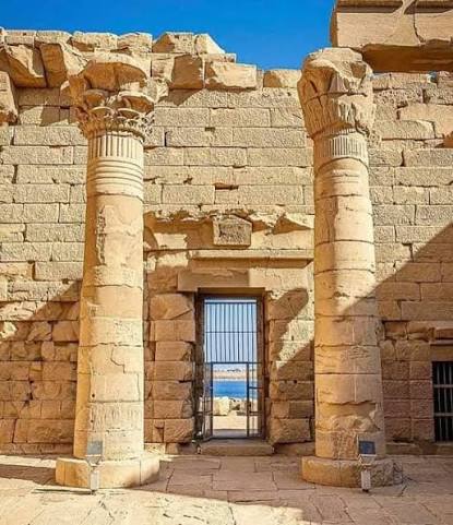 Close-up view of the historic columns and stone walls at Kalabsha Temple in Aswan.