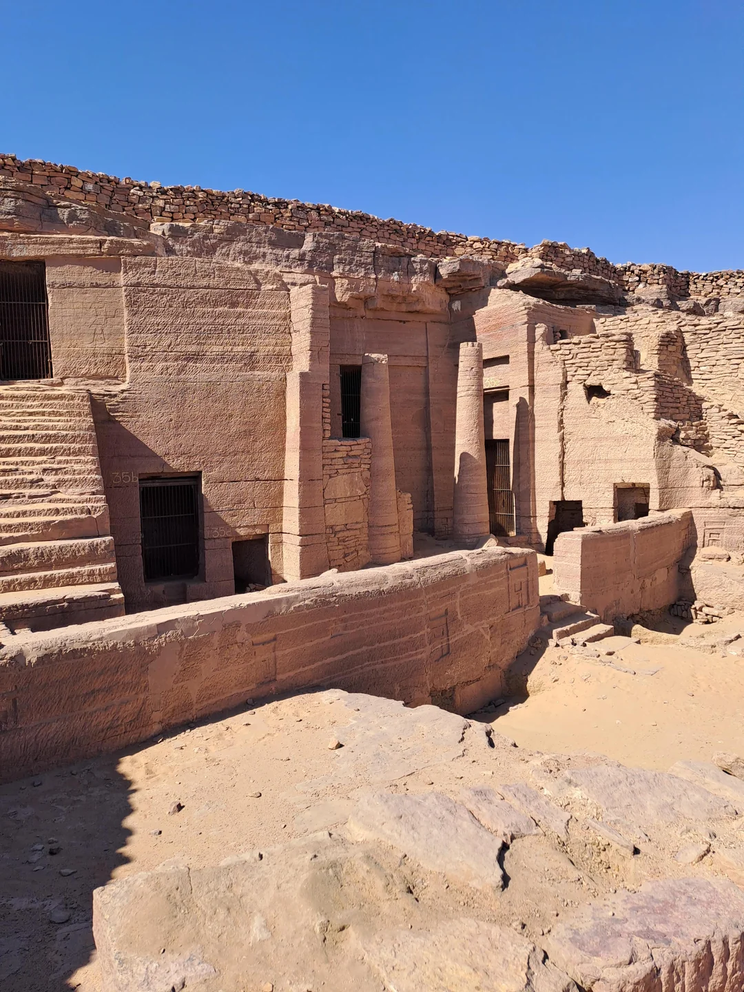 Ancient rock-cut tombs at the Tombs of the Nobles in Luxor, Egypt